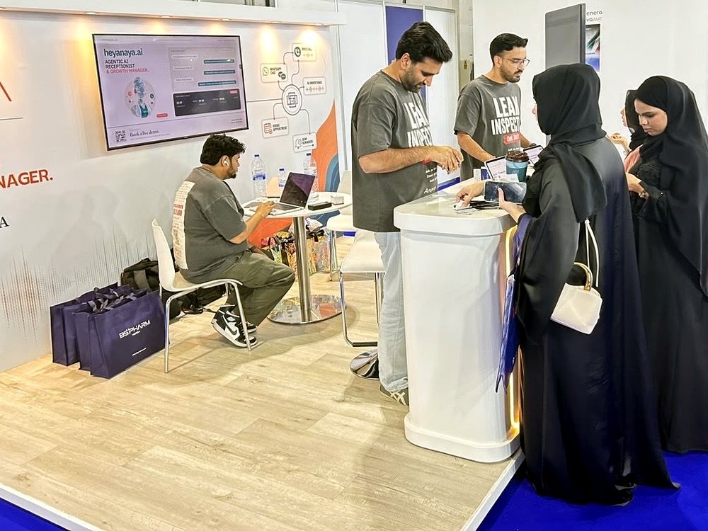 Visitors trying Anaya on tablets at the stand